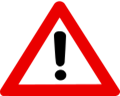 red triangle with black exclamation point