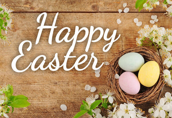 Happy Easter. A nest with three eggs in it.