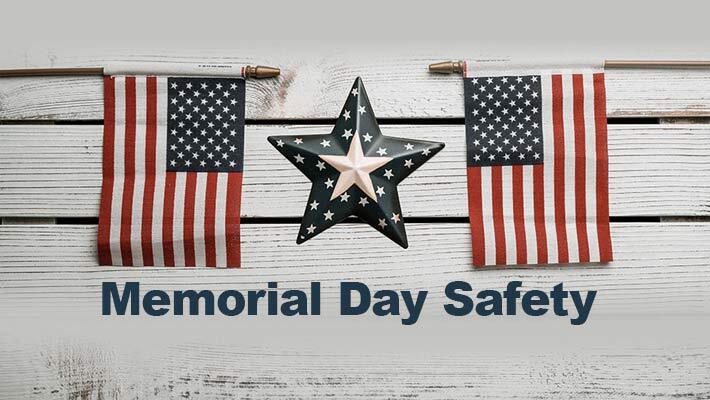 Memorial Day. A star with two small flags on either side.
