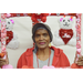 a woman in a valentines frame photo booth