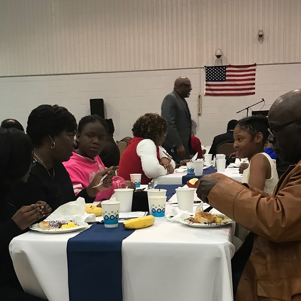 MLKDayBreakfast2normal.jpg guests eating at the MLK Day Breakfast