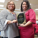 Ms. Clark presenting a 15 years service recognition plaque to Debra Jackson