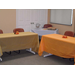 Empty tables are covered in fall and Thanksgiving themed colors and the bingo table its in the back corner. 