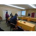 Residents begin to pull up their chairs to the tables to start their game of bingo.