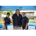  Three woman from Georgia Power smile for a picture. 